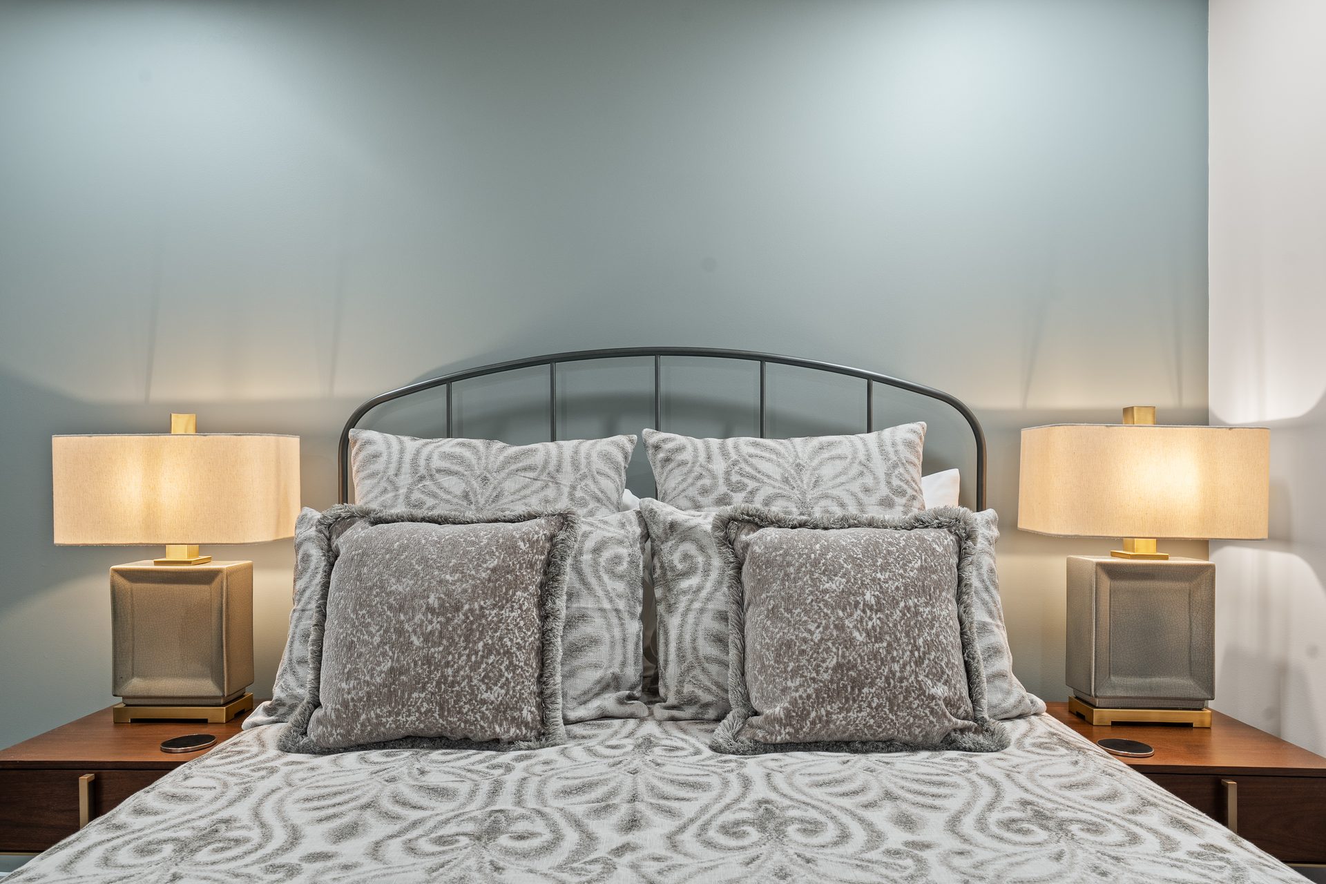Renovated bedroom with new paint, trim, lighting and luxury vinyl plank flooring