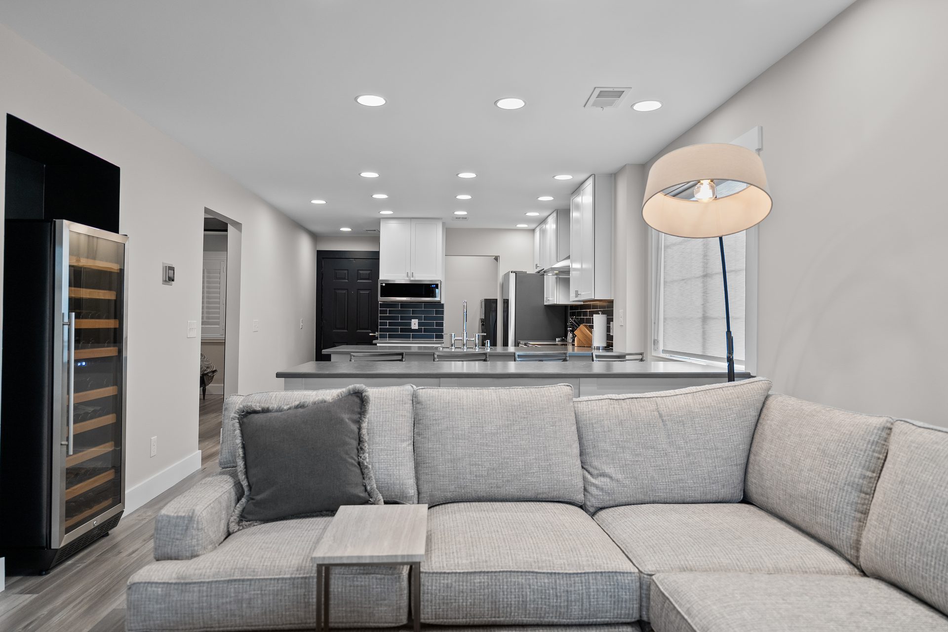 Renovated North Myrtle Beach condo interior looking from the living area through to the kitchen