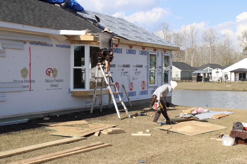 Baldwin Builders crew framing a new custom home on a coastal South Carolina lot